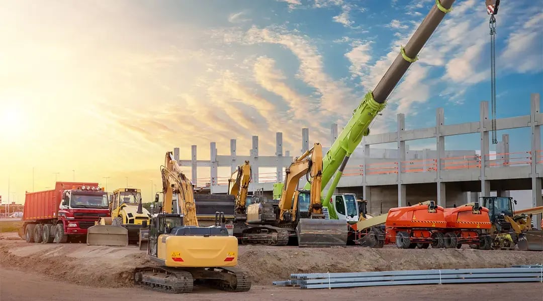 Large, busy construction site filled with vehicles and equipment