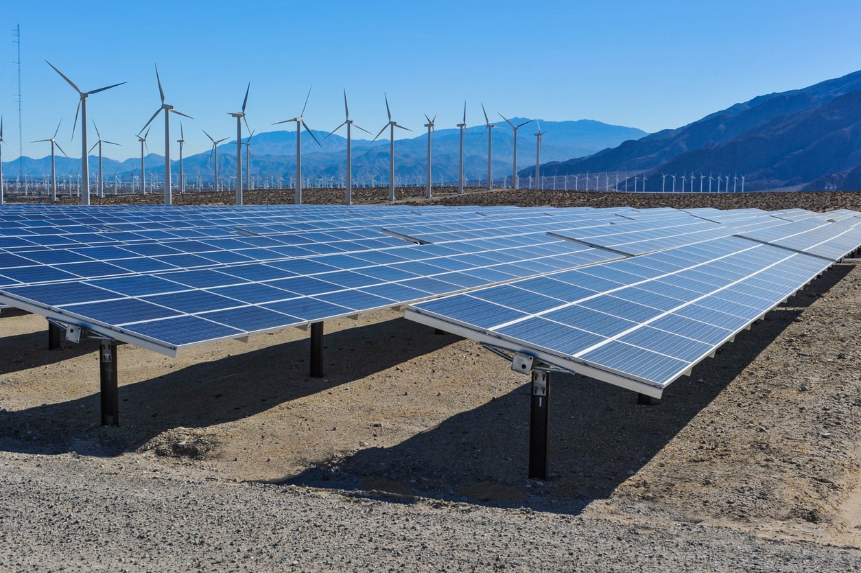Rows-of-solar-panels-and-wind-turbines-capture-the-sun-and-wind