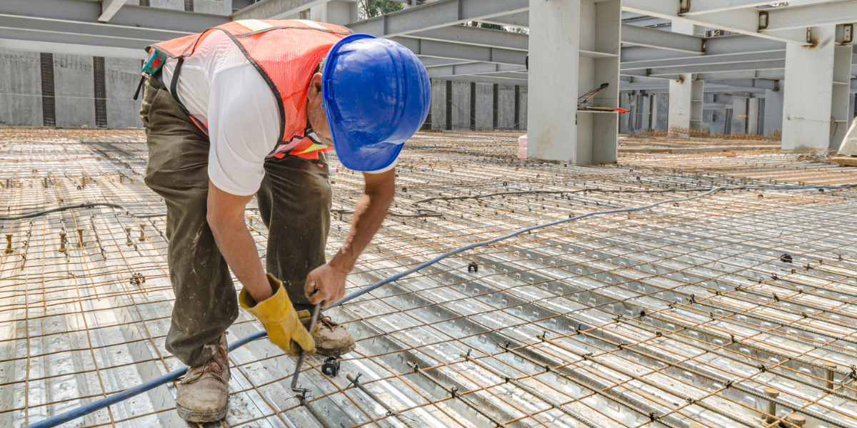 contractor adjusting steel